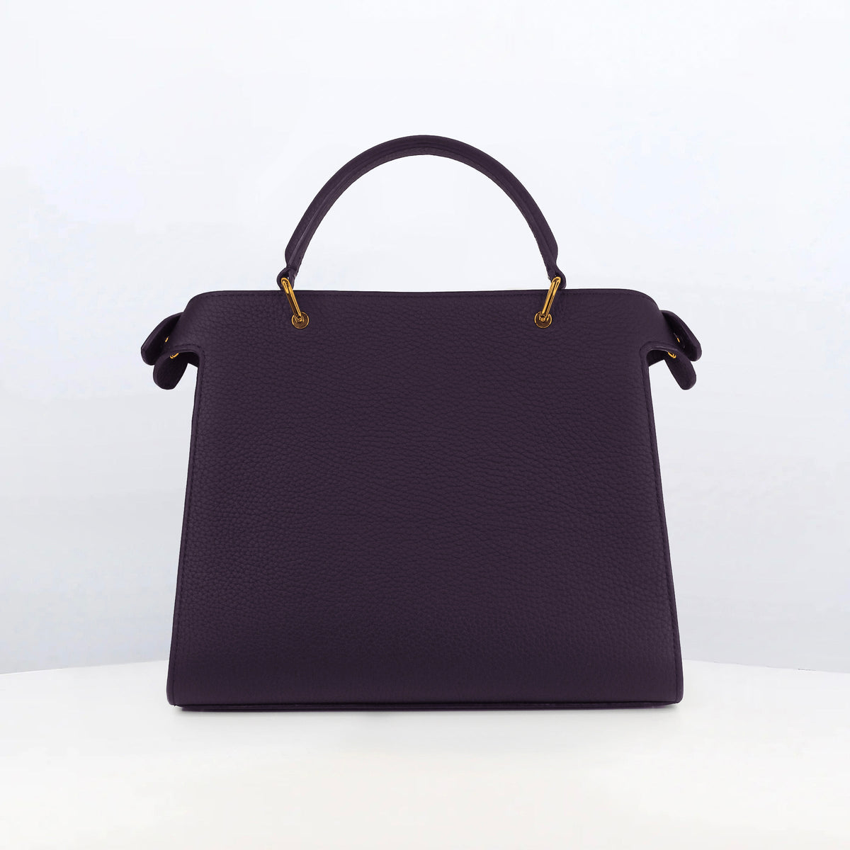 LEATHER HANDBAG LUTECE 27 RAISIN WITH GOLD HARWARE