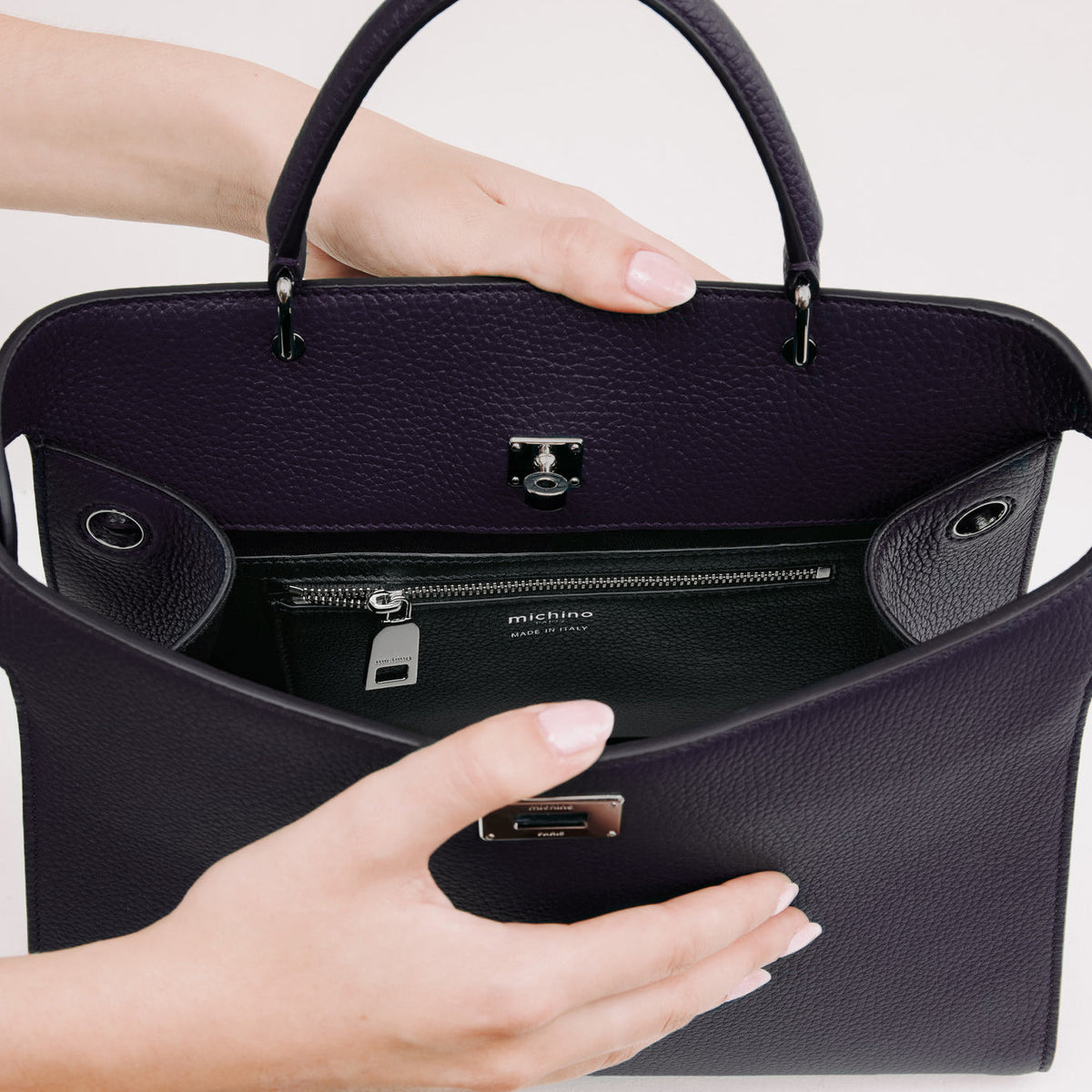 LEATHER HANDBAG LUTECE PM RAISIN