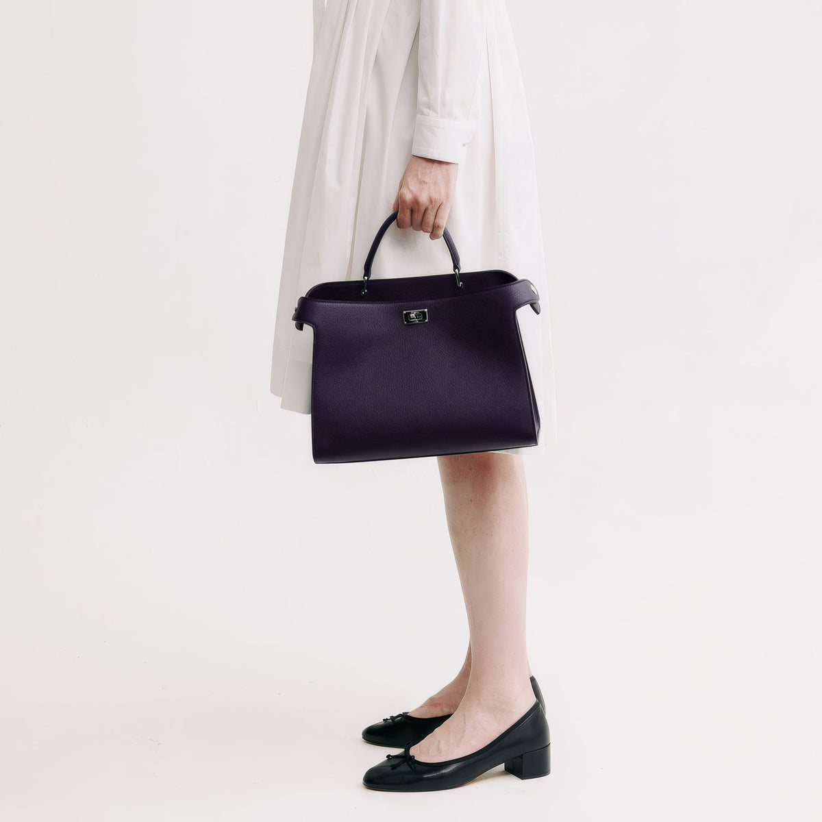 LEATHER HANDBAG LUTECE PM RAISIN