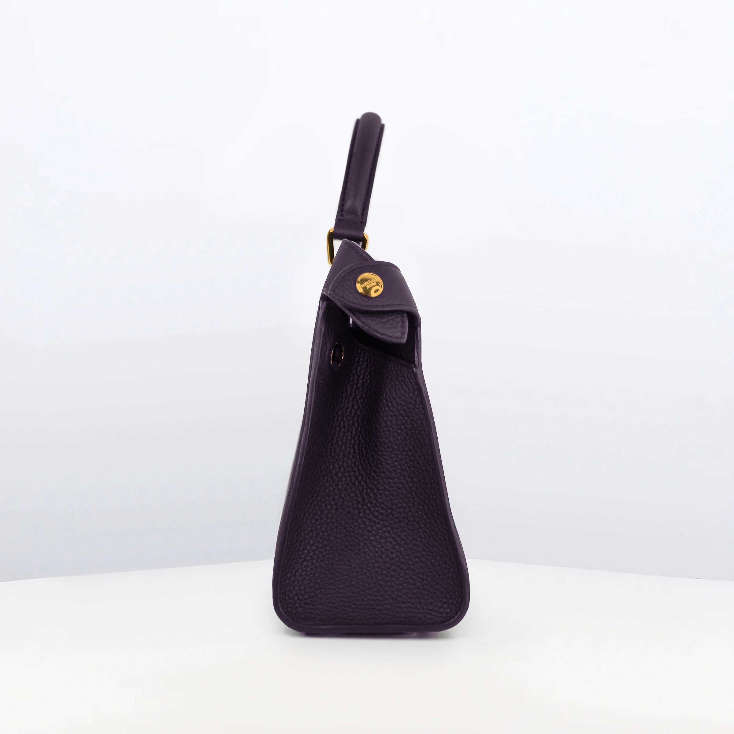 LEATHER HANDBAG LUTECE 27 RAISIN WITH GOLD HARWARE