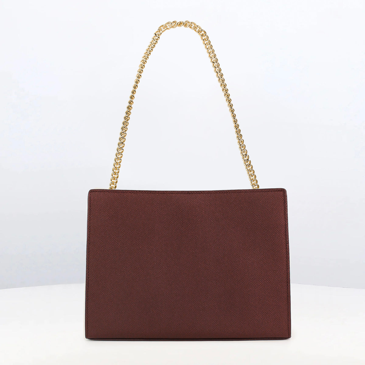 POCHETTE MONTAIGNE IN LEATHER PRUNE