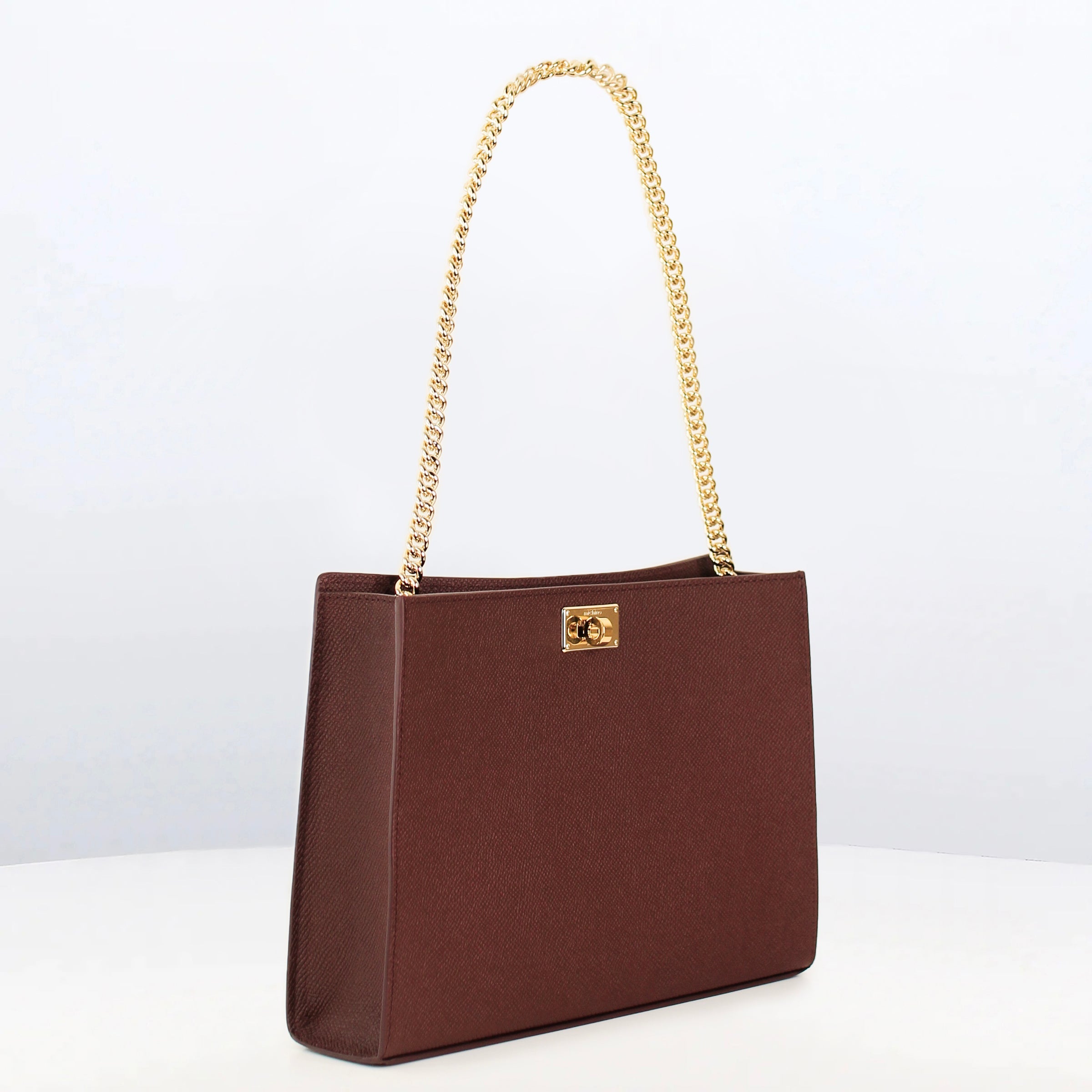 POCHETTE MONTAIGNE IN LEATHER PRUNE